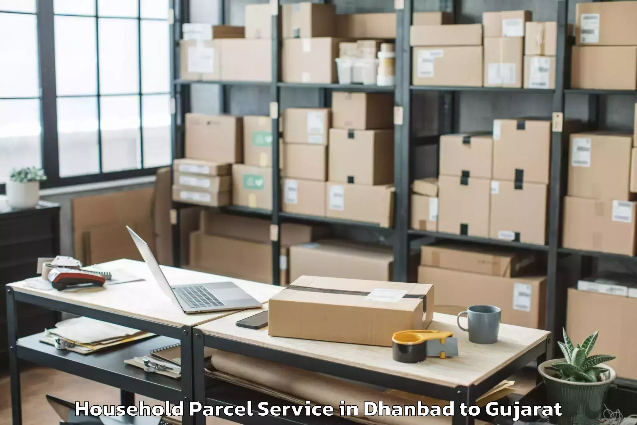 Book Dhanbad to Mehmedabad Household Parcel Online